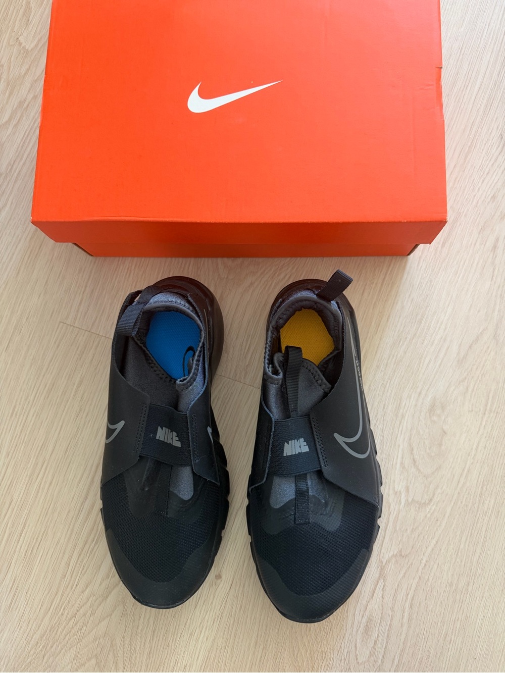 Nike Kids Black Slip-On Sneakers with Blue & Yellow Insoles